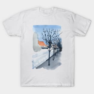 Black trees and European street under the blue sky. T-Shirt